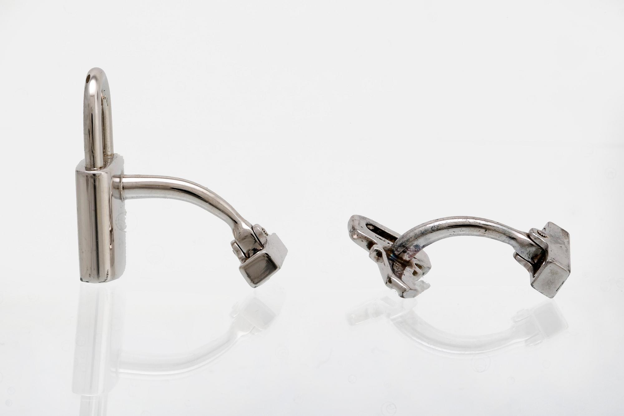 Louis Vuitton, silver, cufflinks, case Damier ebene canvas.