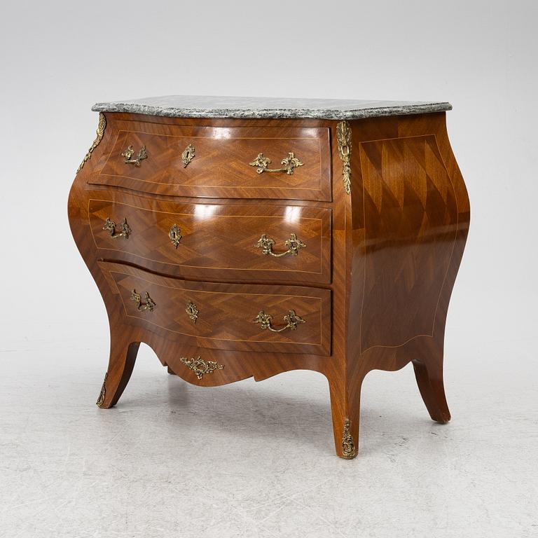 A Rococo style chest of drawers, first half of the 20th Century.
