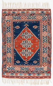 A semi-antique Turkish rug, 175 x 123 cm.
