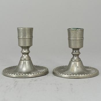 Four pewter candlesticks, one with mark of Hans Wicksten, Västerås (1782-1814).