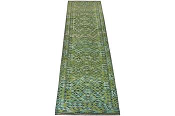 An Afghan kilim runner, c. 488 x 79 cm.