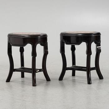 A pair of black-lacquered stools, Japan, around 1900.