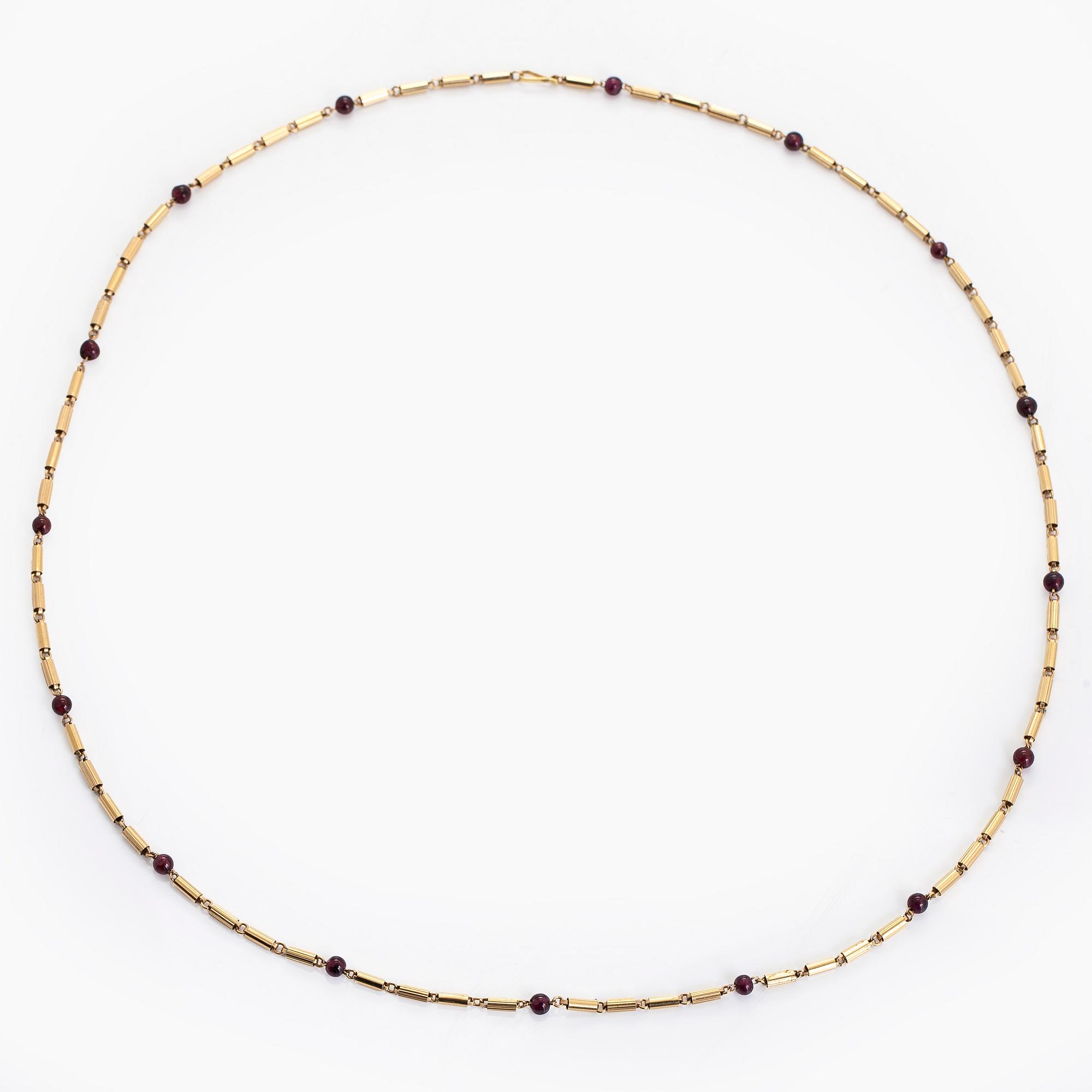 A 16K gold necklace with garnets.