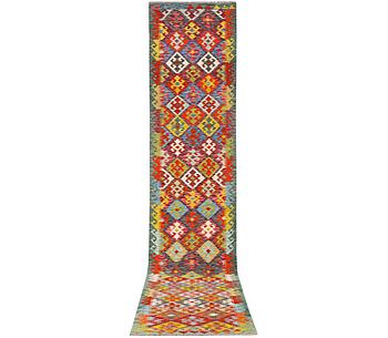 A runner carpet, Kilim, c. 507 x 85 cm.