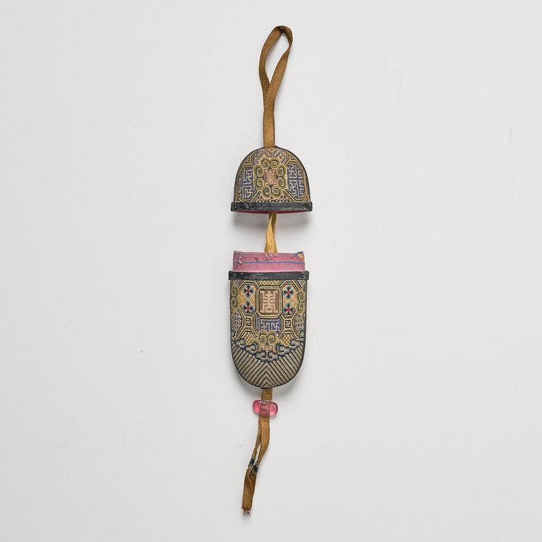 A set of three embroidered purses/ eye-glass cases, Qing dynasty, 19th century.