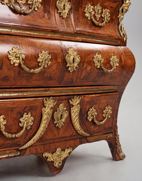 A Swedish early rococo parquetry, ormolu-mounted and marble commode, presumably by S. Pasch or J. Wulf , ca. 1740.