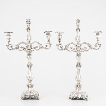 A pair of silver candelabra/candlesticks, Baroque style, probably Poland, dated 1855.