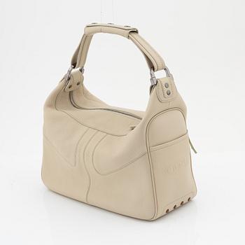 Tod's, a beige leather bag.