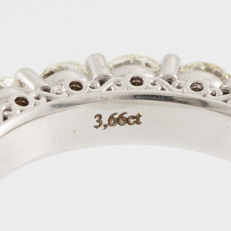 Ring, full eternity, 18K white gold set with brilliant-cut diamonds.