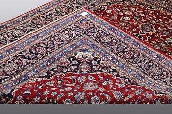 A carpet, Mashad, ca 346 x 248 cm.