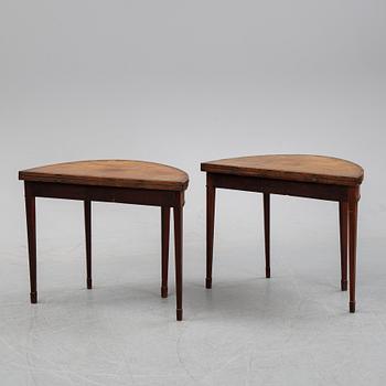 A pair of George III demi-lune mahogany card tables, first half of the 19th Century.