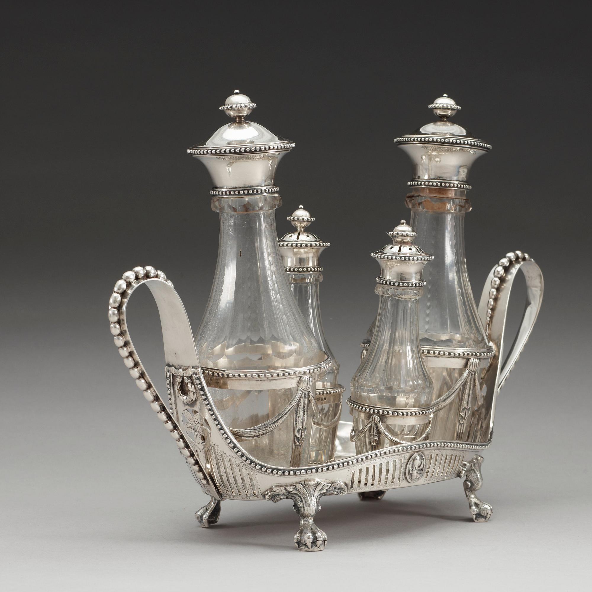 BORDSSURTOUT för fyra flaskor, av Petter Eneroth, Stockholm 1787. Gustaviansk.