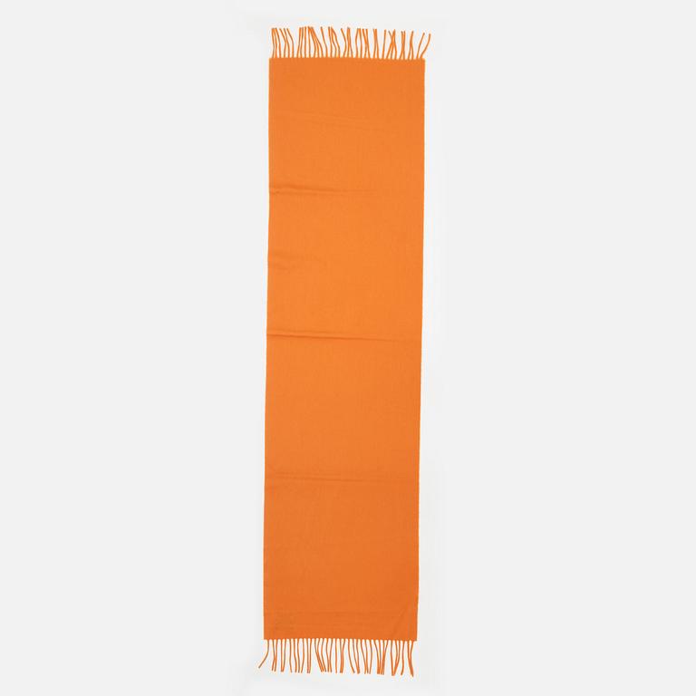 Hermès, a orange cashmere scarf.