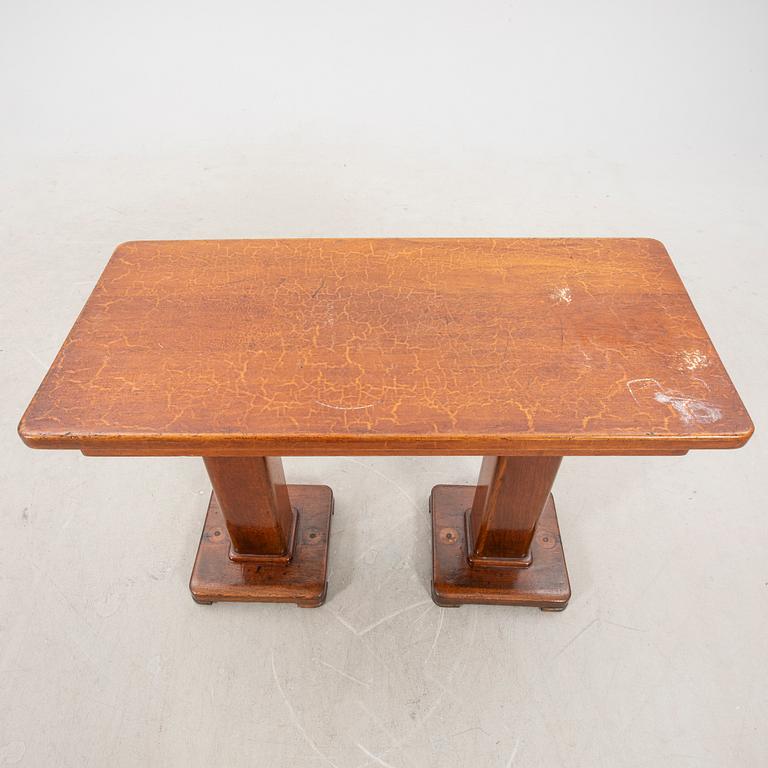 A set of table and two benches from a ship 20th century.