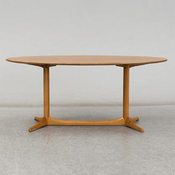 A 1959 'Plommonet' walnut coffee table by Kerstin Hörlin-Holmquist for Nordiska Kompaniet.