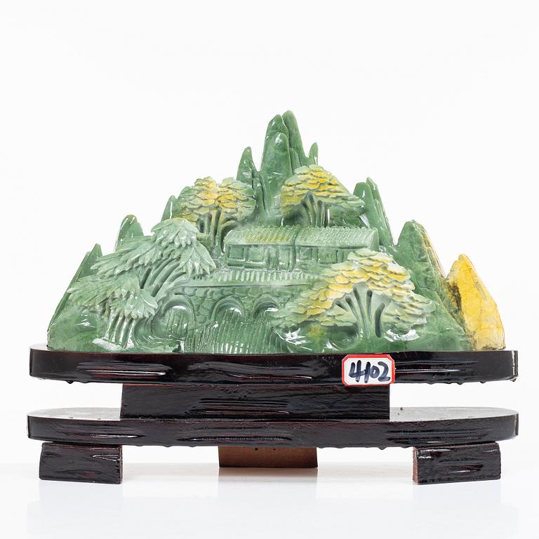 A serpentine jade csulptural carving, China, modern manufacturing.