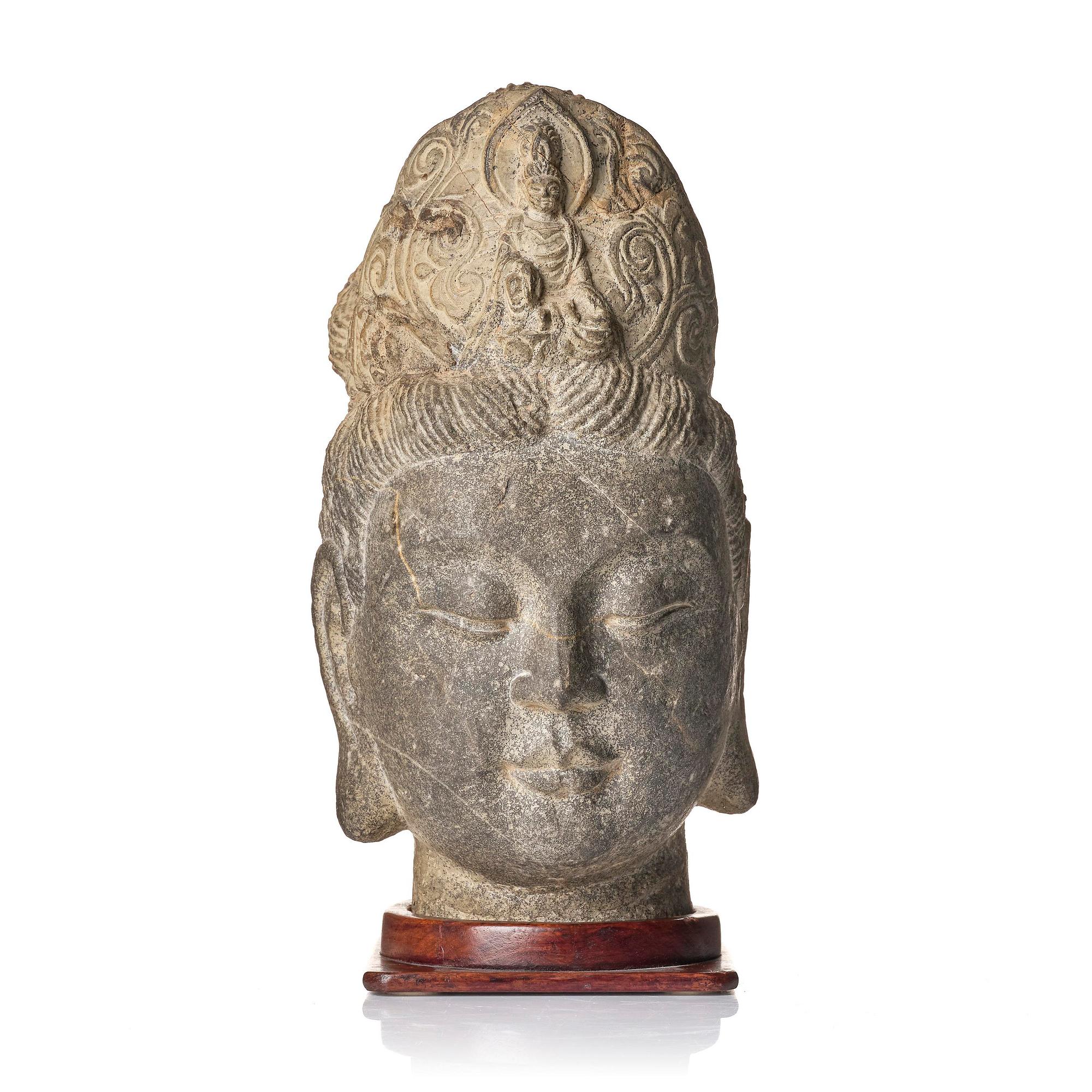 A large well sculptured head of Guanyin, Ming dynasty (1368-1644).
