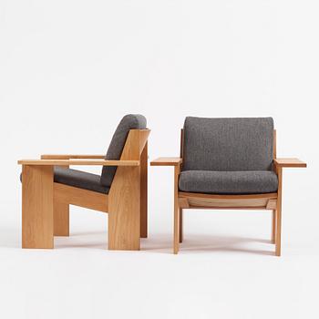 Uno & Östen Kristiansson, a pair of armchairs, an ottoman and a table model "Breda", Luxus, Vittsjö 1960s.