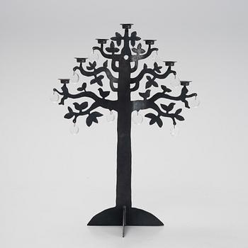 a blackened iron candelabrum, 'Livets träd', by Bertil Vallien for Boda Smide.