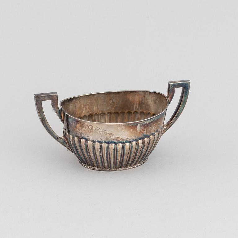 A silver coffee pot, creamer and sugar bowl, AG Dufva, Stockholm 1914.