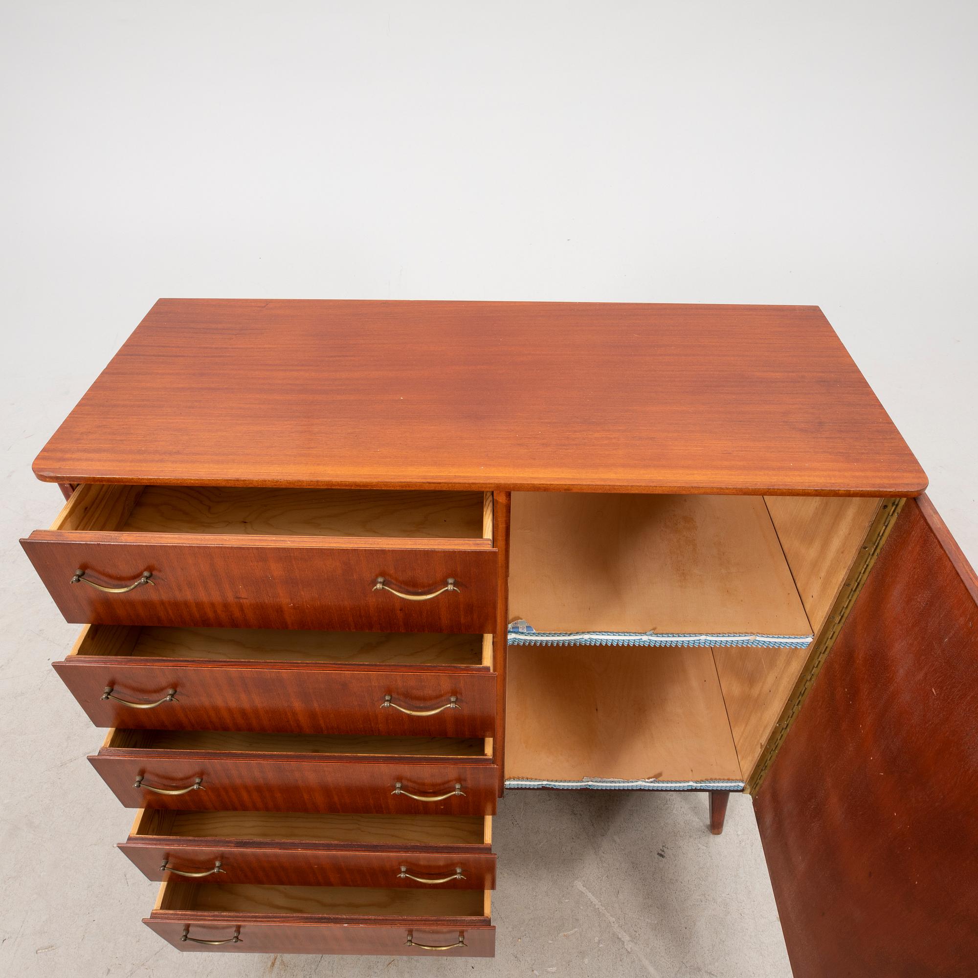 A 1950s teak sideboard/cabinet.