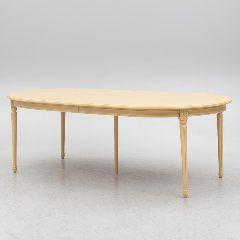 A Gustavian style dining table with six dining chairs, Sweden, 21st century.