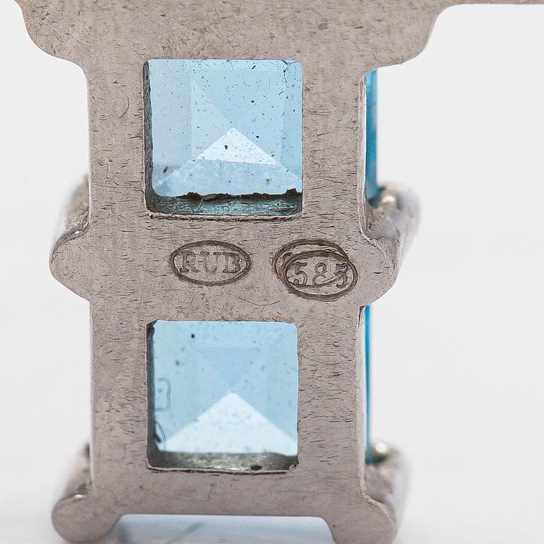 Hänge i form av kors, 14K vitguld med topaser.