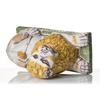 A pair of Luneville recumbent lions, circa 1780-1800.
