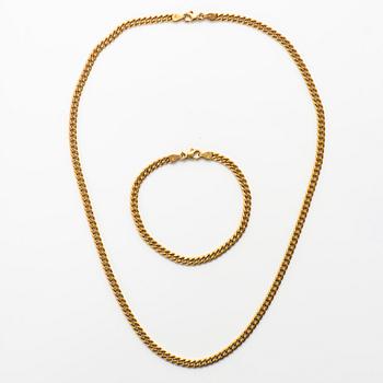 A set of 14K gold necklace and bracelet.