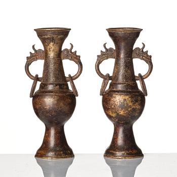 A pair of bronze altar vases, Ming dynasty (1368-1644).