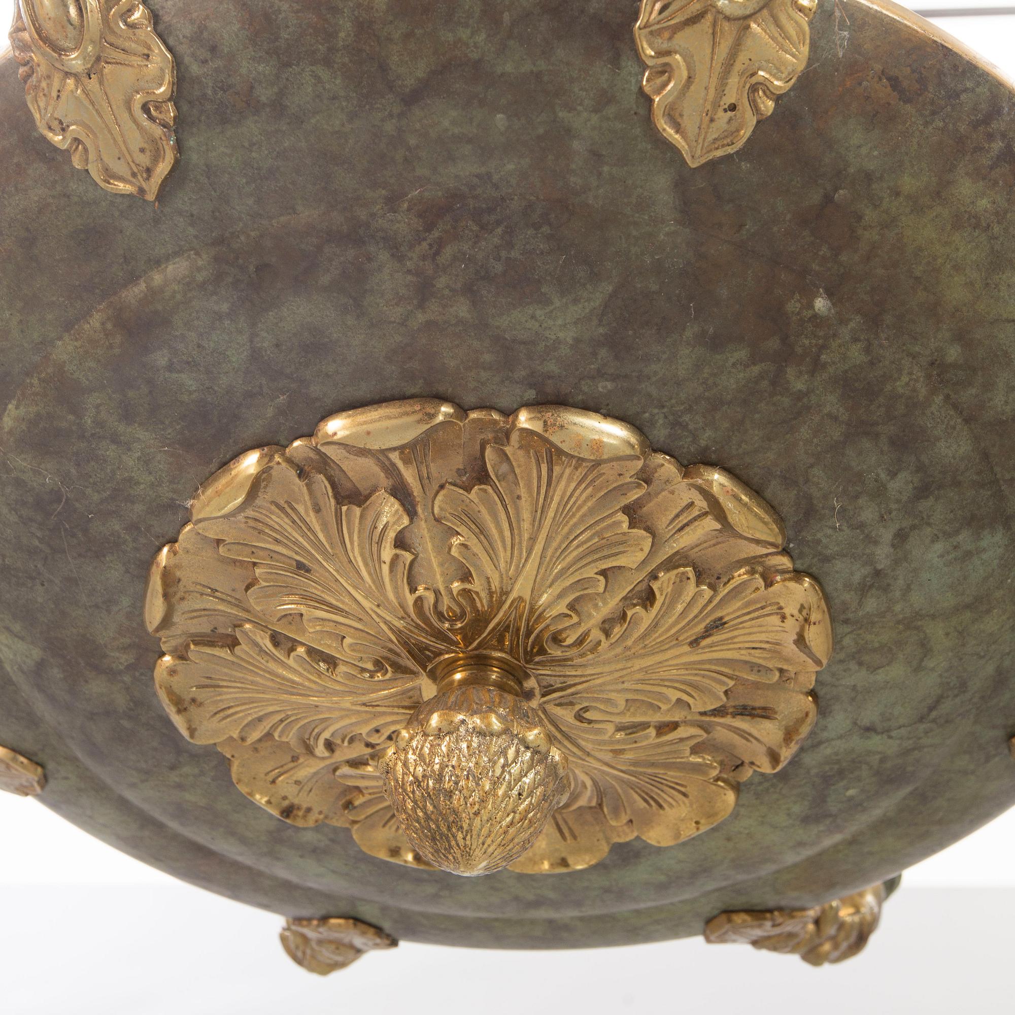 An empires style mid 1900s celing pendant.