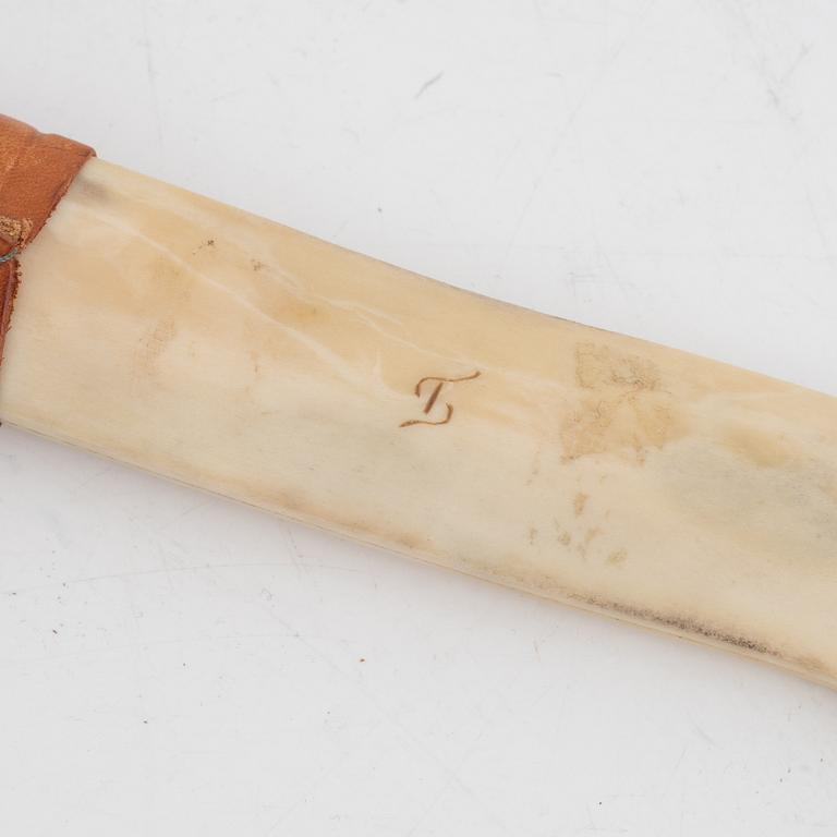 Thore Sunna, a reindeer horn knife, signed.