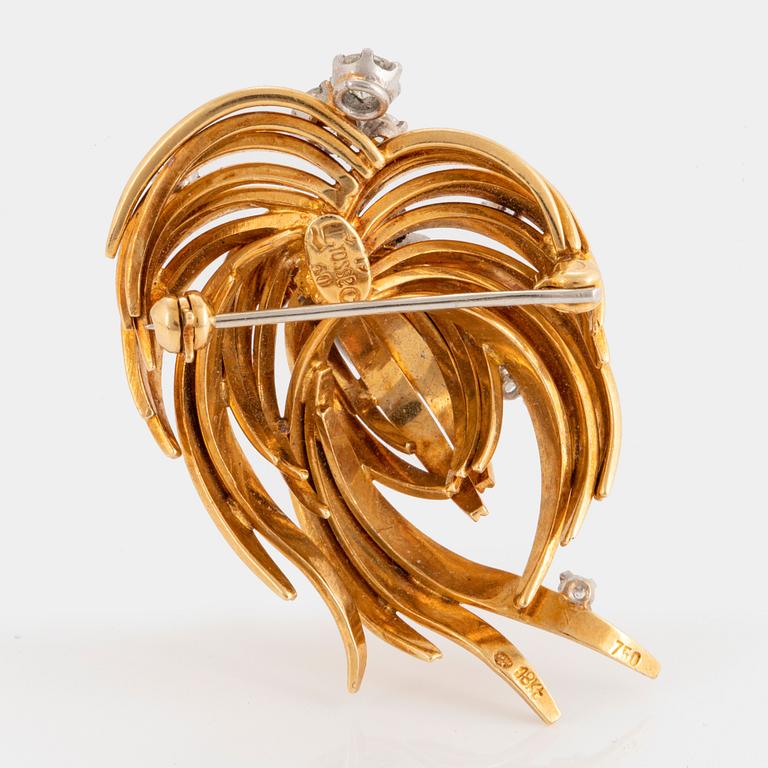 Brosch 18K guld med runda briljantslipade diamanter.