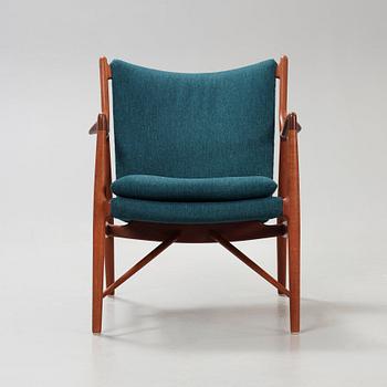 A Finn Juhl 'NV-45' teak easy chair, by cabinetmaker Niels Vodder, Denmark 1950's.