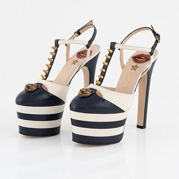 Gucci, a pair of navy and white leather high heel shoes, 2016, size 37.