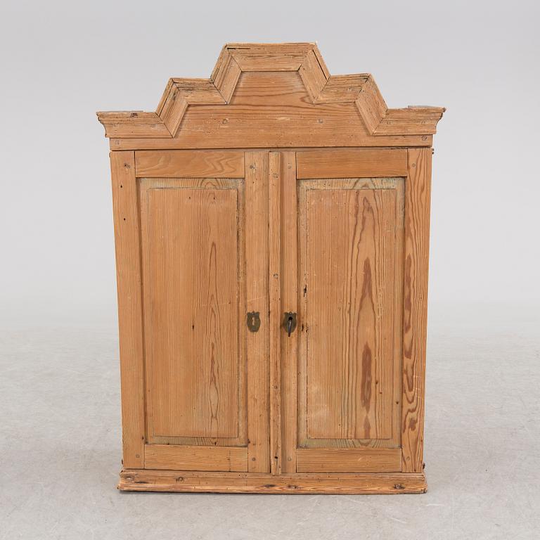 A first half of the 19th century cabinet.