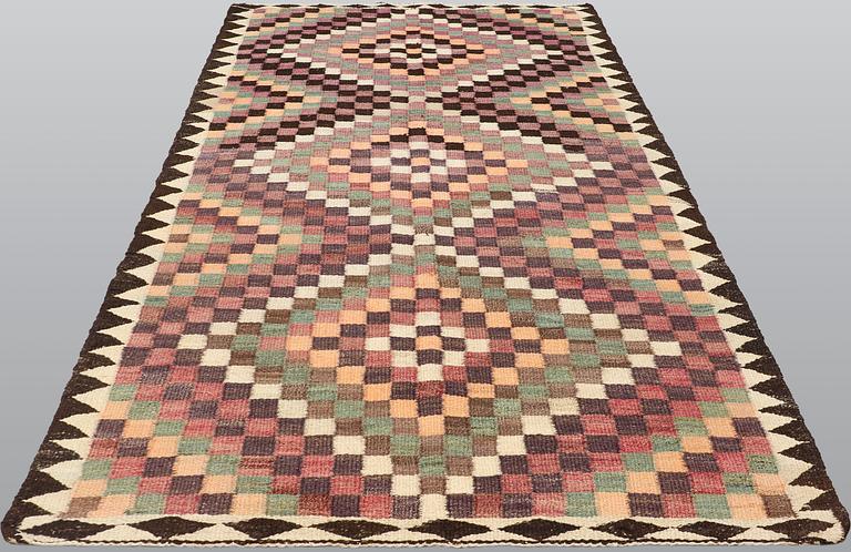 A carpet, Persian nomad Kilim, ca 290 x 150 cm.