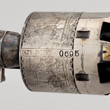 A percussion revolver, Colt 1851 Navy, in case, from the year 1863.