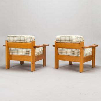 A pair of 1970's armchairs.