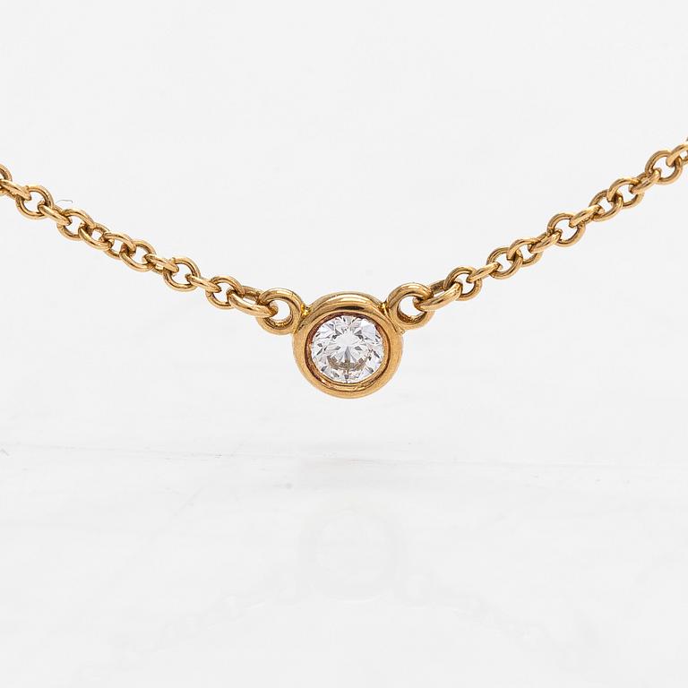 Tiffany & Co, Elsa Peretti, collier, 18K guld med en briljantslipad diamant ca 0.05 ct.