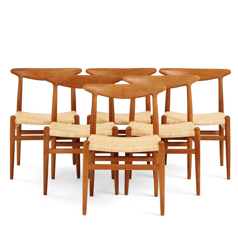 Hans J. Wegner, a set of 6 "W2" chairs, for C.M. Madsens Fabriker, Denmark 1950's.