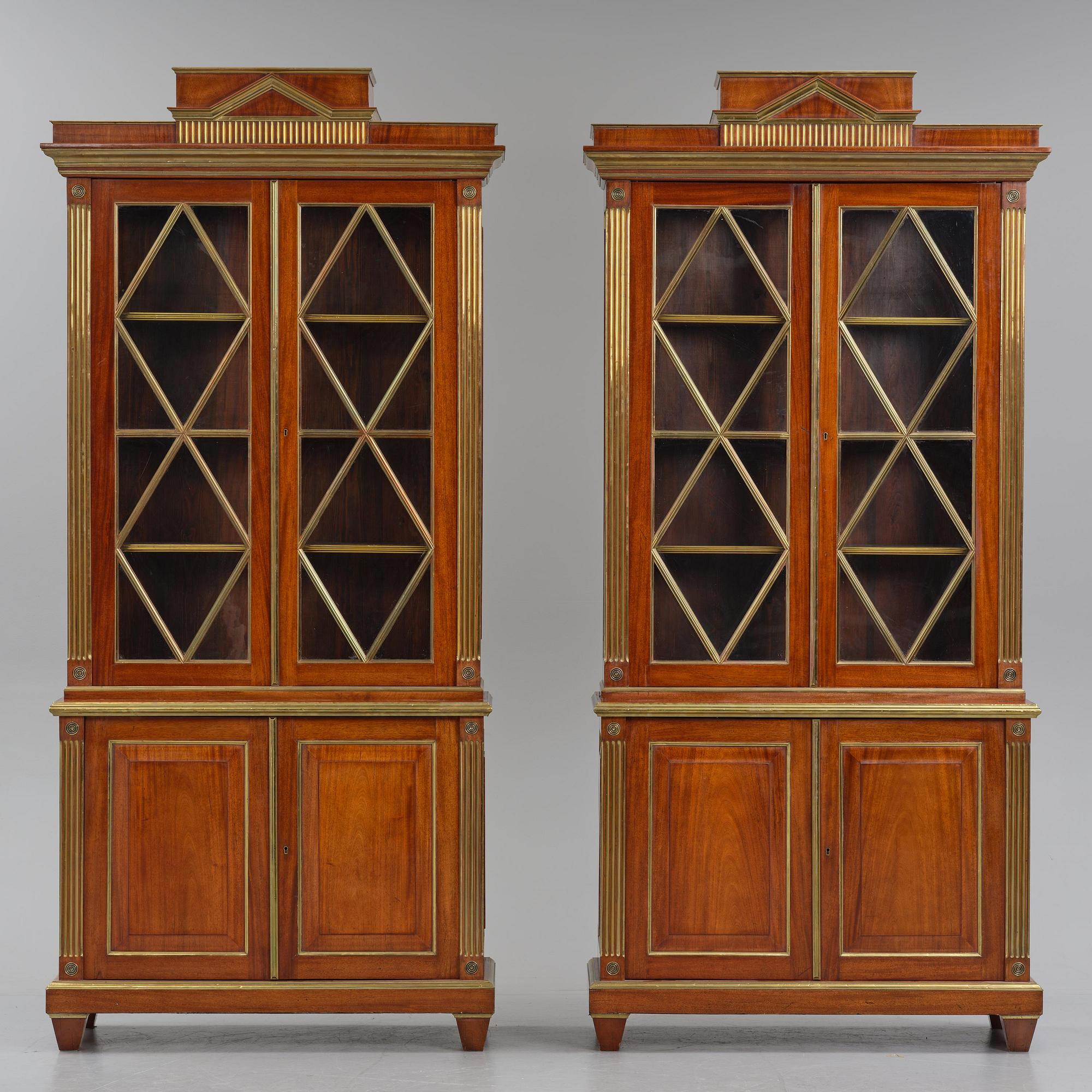 A pair of Russian mahogany and brass-mounted Jacob-style bibliothèques, modern with old parts.