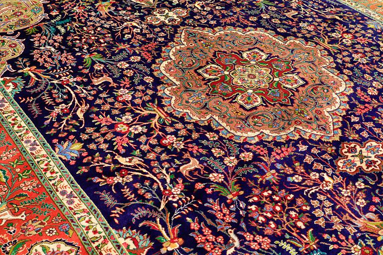 A CARPET, Figural Tabriz, ca 407 x 304 cm.
