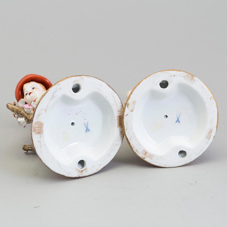 a pair of porcelain figurines marked similar to meissen, 20th century.