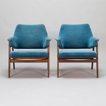 A pair of mid 20th century armchairs.