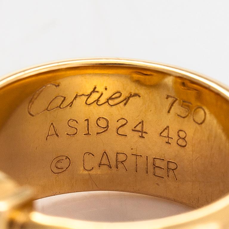 Cartier, an 18K yellow and white gold 'Double C' ring.