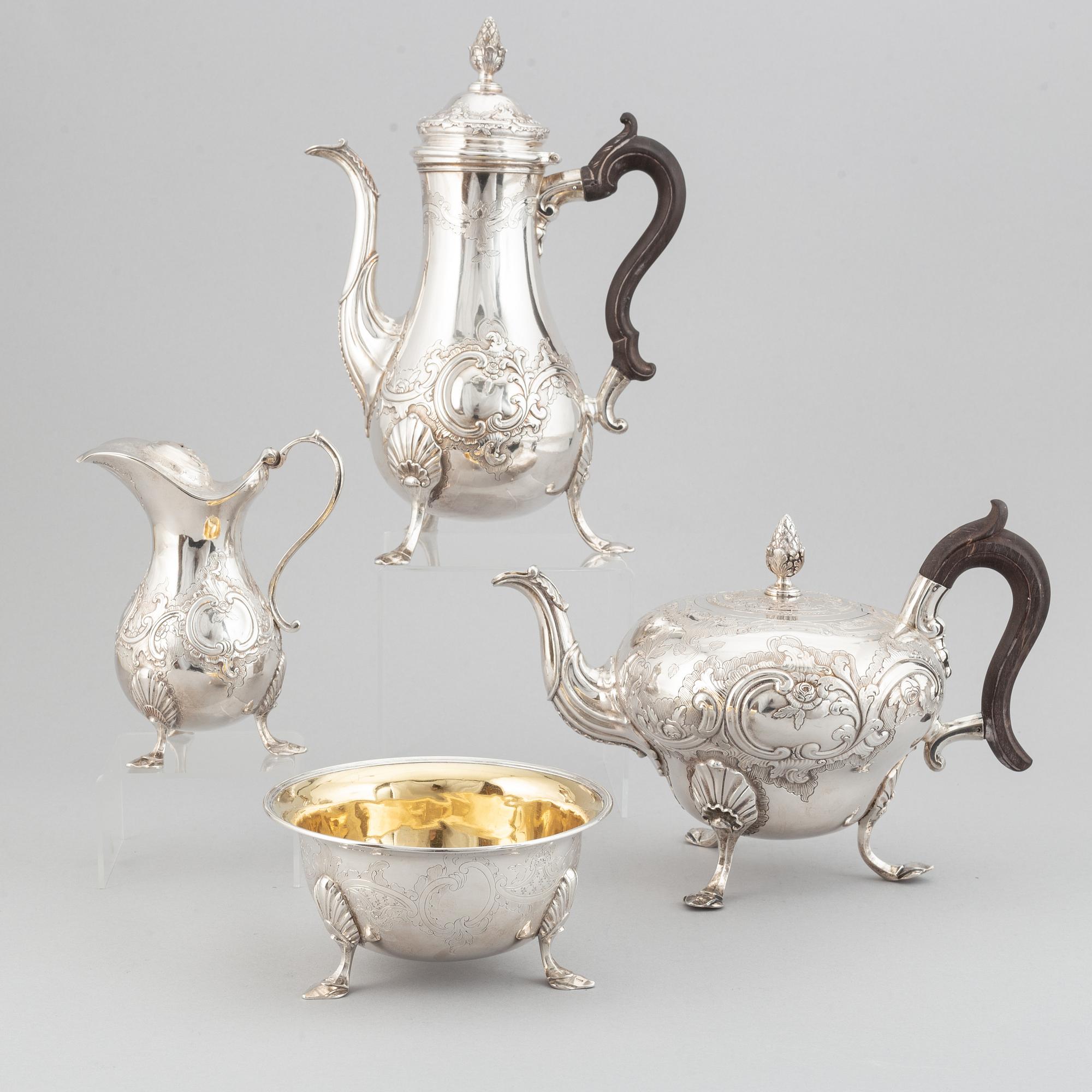 A parcel-gilt silver rococo coffee pot, teapot, creamer and bowl ...