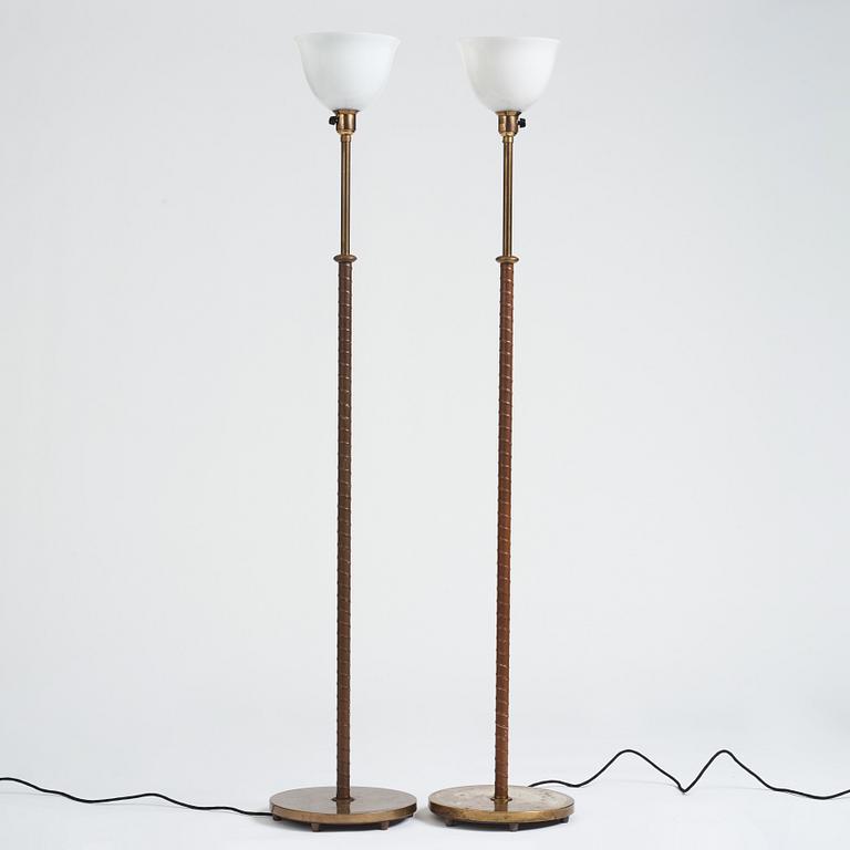 Harald Notini, a pair of floor lamps, model "15242", by Böhlmarks, Sweden 1940-50s.