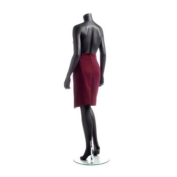 CÉLINE, a burgundy colored wool skirt.