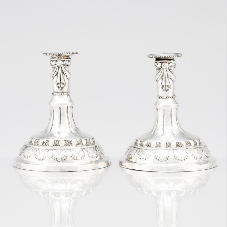 A pair of Swedish silver candlesticks, marks of Sigismund Novisadi the younger, Karlskrona 1780.